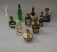 A box of various miniature spirits to include Moscatel Dalmau, Midori Melon liqueur,