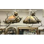 A pair of brass mounted ceiling lights with domed cased glass shade with mottled decoration in the