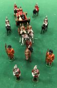 A collection of various Britains painted figures including Royal carriage,