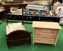 A Victorian miniature half-tester bedstead and painted chest of three drawers