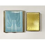 Two silver and guilloche enamel decorated compacts in the Art Deco style