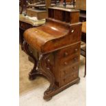 A Victorian burr walnut piano fronted Davenport desk with pop up stationary compartment and