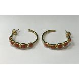 A pair of silver gilt and coral set earrings