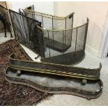 A collection of two brass topped nursery guards, together with a black wrought iron spark guard,
