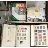 A collection of mid 20th Century and later stamp albums containing various stamps of the world,