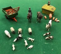 A boxed collection of Dinky, Britains and other farmyard accessories including trailers,