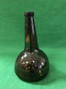 An 18th Century brown glass bottle of onion form CONDITION REPORTS Appears in good