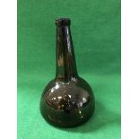 An 18th Century brown glass bottle of onion form CONDITION REPORTS Appears in good