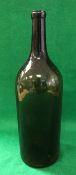 An early 19th Century green glass bottle