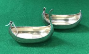 A pair of late Victorian silver open salts as gondolas, one with damage to prow (by Thomas,