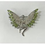 A silver and peridot set brooch as a winged pixie