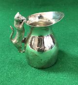 A modern silver cream jug with cast cat handle (by Nicholas Plummer, London 2000), 5.