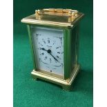 A modern brass carriage clock,