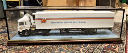 A "Wincanton Chilled Distribution" haulage lorry in glazed and wooden display case,