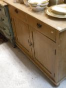 A pine cupboard,