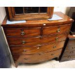 A Victorian mahogany bow fronted chest of two short over three long drawers