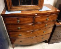 A Victorian mahogany bow fronted chest of two short over three long drawers
