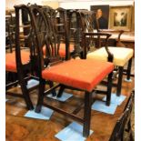 A set of twelve 19th Century mahogany framed Chippendale style dining chairs with pierced and