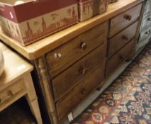 A pine chest of six drawers