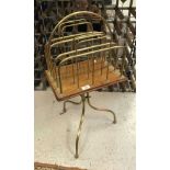 A circa 1900 brass and mahogany four section revolving magazine rack