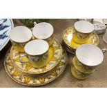 A Royal Worcester part tea set decorated with floral sprays on a yellow ground,