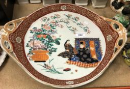 A 19th Century Japanese polychrome decorated two handled dish,