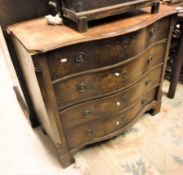 A 19th Century walnut serpentine chest of four long drawers