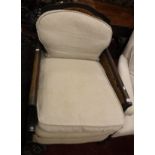 A circa 1900 Bergere two seat sofa together with two matching armchairs