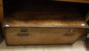 A brass bound camphor wood trunk