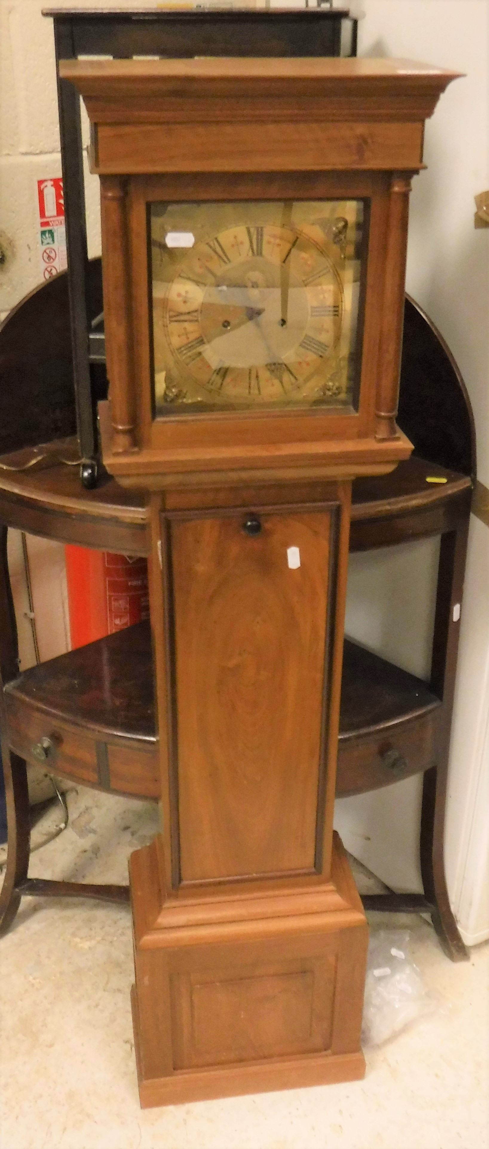 A modern walnut longcase clock of small proportions,