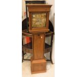 A modern walnut longcase clock of small proportions,