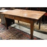 A 19th Century French fruitwood kitchen table with single frieze drawer,