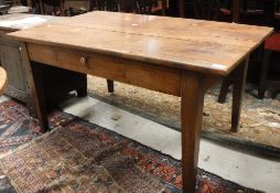A 19th Century French fruitwood kitchen table with single frieze drawer,