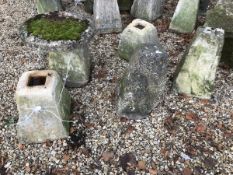 Six various staddle stone bases and one top