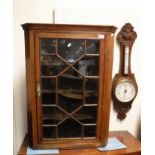A Victorian oak cased barometer / thermometer,