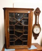 A Victorian oak cased barometer / thermometer,