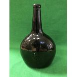 An 18th Century black glass bottle of moon flask form CONDITION REPORTS Main body of