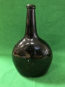 An 18th Century black glass bottle of moon flask form CONDITION REPORTS Main body of