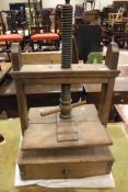A 19th Century oak table top book press
