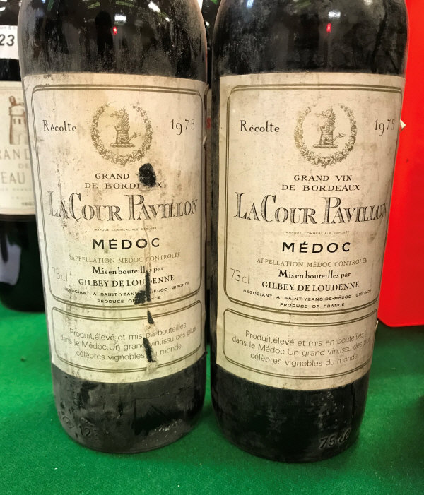 Two bottles La Cour Pavillon Médoc 1975 and two bottles Fonset-Lacour Bordeaux Barton & Guestier