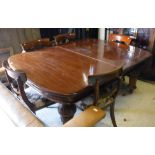 A Victorian mahogany extending dining table