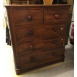 A Victorian mahogany chest of two short over three long drawers raised on a plinth base