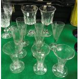 A collection of various 19th Century wine glasses to include three with engraved hop decoration,