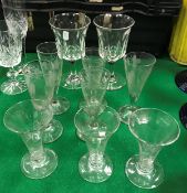 A collection of various 19th Century wine glasses to include three with engraved hop decoration,