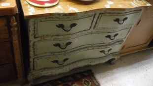 A One World painted oak chest in the 18th Century French manner,