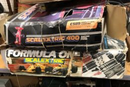 A Scalextric 400-C589 kit (boxed) together with another "Formula One" and a box of various track