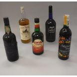 A mixed lot of wines and spirits including Harveys Bristol Cream Sherry 1 litre and 75cl,