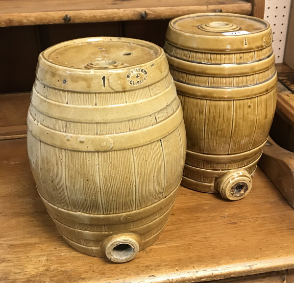 Two 19th Century stoneware spirit barrels, one impressed "Grosvenor Bridgeton Pottery Glasgow",