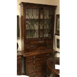 A Victorian mahogany and inlaid bureau bookcase cabinet,