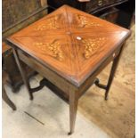 An Edwardian rosewood and inlaid envelope card table the base united by an under tier